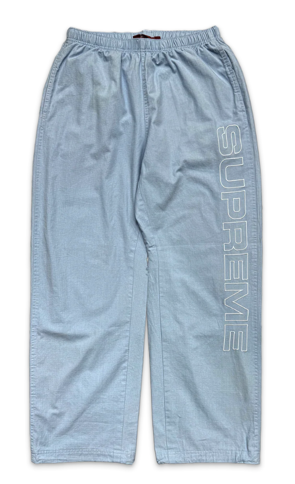 Supreme Spellout Ripstop Track Pants FW25 "Light Blue"